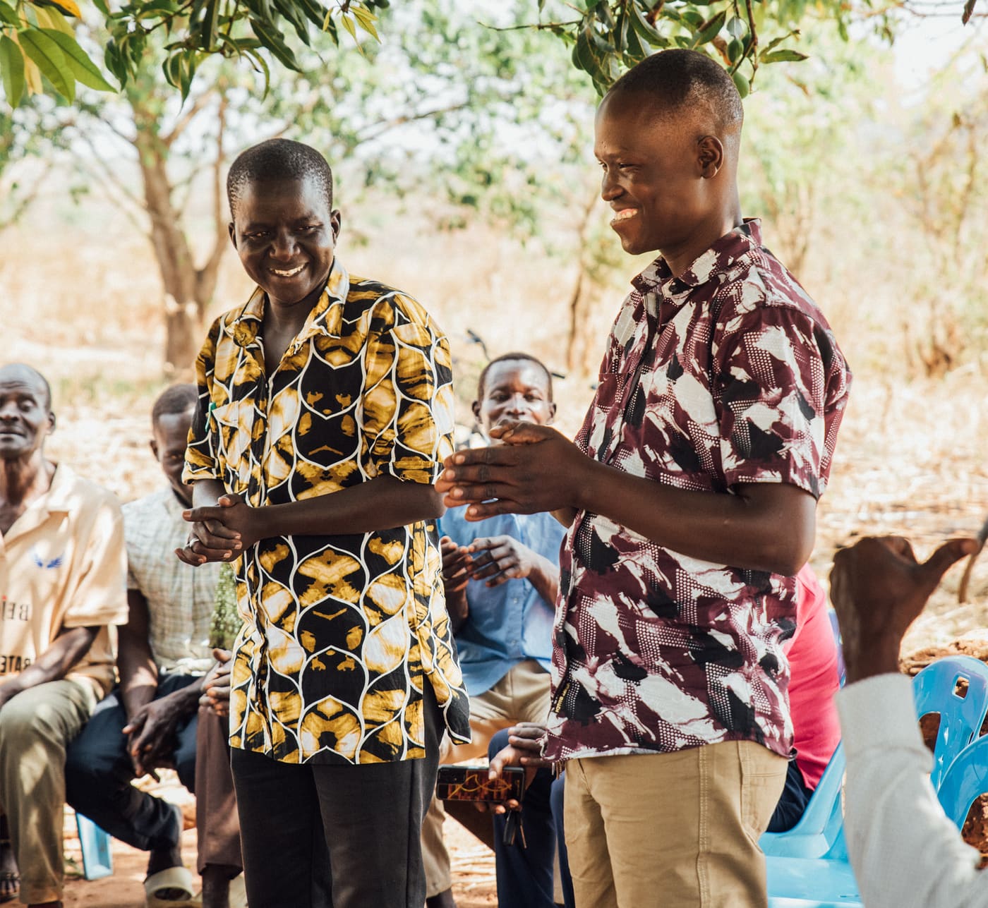 A Portable Bible School session — Bibles being received and taught